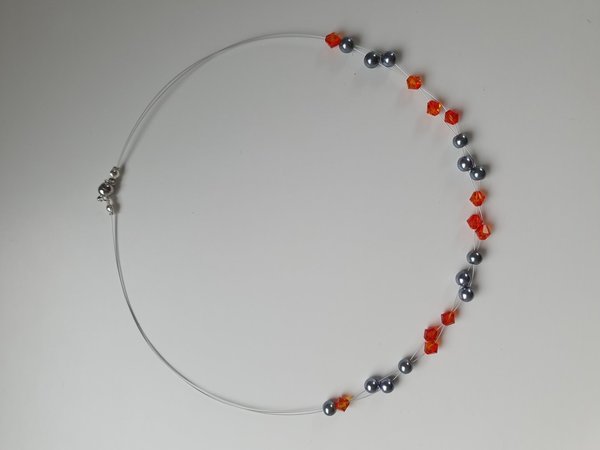 Halskette silbergrau und orange mit Swarovski